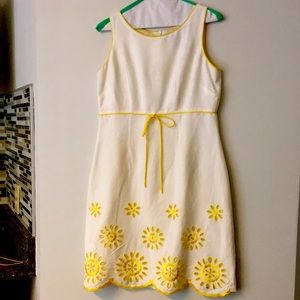 Sleeveless, white dress w yellow trim. Size 8P